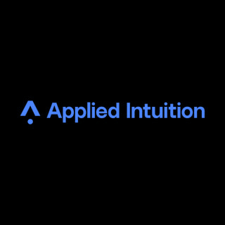 DoomBench-blue rendering of the Applied Intuition logo against a black background.