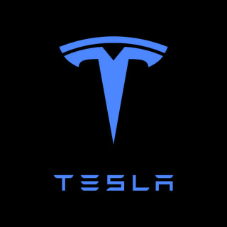 DoomBench-blue rendering of the Tesla logo against a black background.