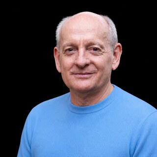 AI-generated portrait of Stuart Russell wearing a DoomBench-blue top against a black background.